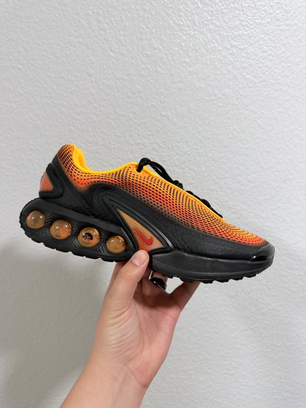 Nike black and orange airmax DN